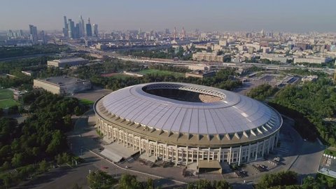 
Slow steady cam fly over the main stage of FIFA World Cup 2018. Luzhniki stadium aerial footage. Autumn 2017 actual situation of Moscow stadium construction.