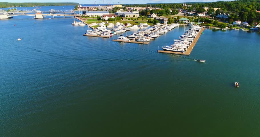 Aerial flyover of Beautiful marinas, canal, waterfront and boats, Sturgeon Bay, Wisconsin.
