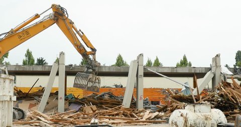 STRASBOURG, FRANCE - CIRCA 2017: Liebherr A 914 Litronic wheeled excavator cleaning debris on construction site