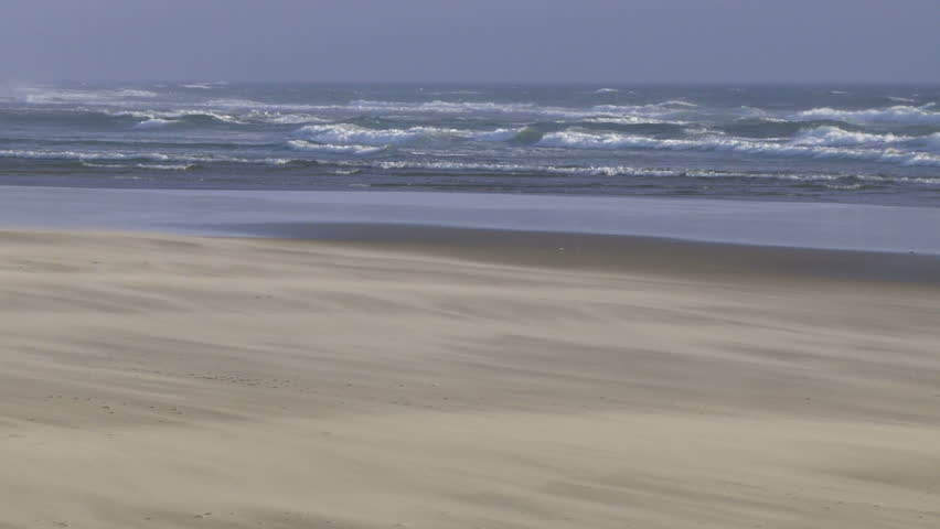 Ocean surf and sandy beach on the windy Oregon coastline