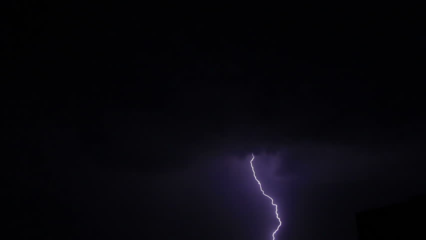 Bright lightnings over corner of roof of building in night stormy sky | Shutterstock HD Video #30873577