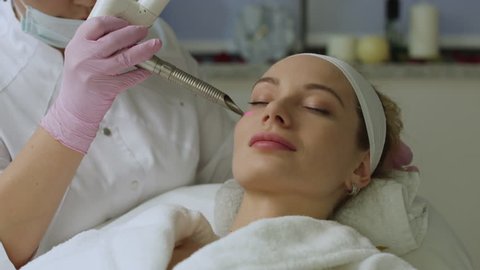 Spa. Skin treatment facial laser. Modern equipment.