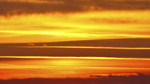 Dusk stripes

Description: Sunset with orange cloudy stripes.
