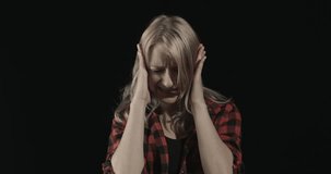 Young woman with a big headache
