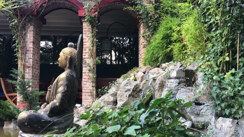 Chinese statue with nature view.