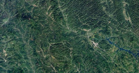 Very high-altitude overflight aerial of karst geology (rounded mountains) in Guangxi Province, southeast China. Clip loops and is reversible. Elements of this image furnished by NASA