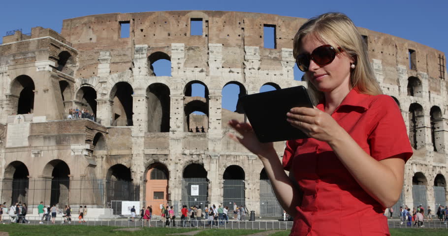 4K Business woman work on digital tablet, girl  read online near Colosseum In Rome 