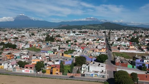 Cholula Mexico flying over beautiful city in Puebla aerial Footage