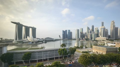 Singapore city skyline during sunset, from day, dusk to night, 4k UHD time lapse video. 