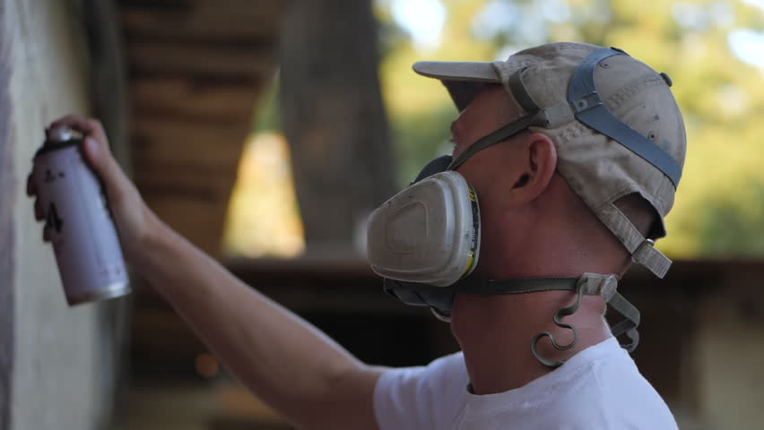 Graffiti Artist In Protective Mask Stock Footage Video 100 Royalty Free Shutterstock