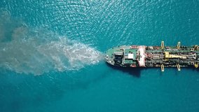 Suction-Dredger vessel at sea - Top down aerial footage