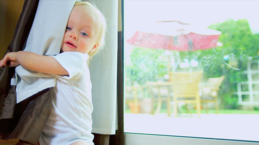 Young Child Laughing Hiding Game