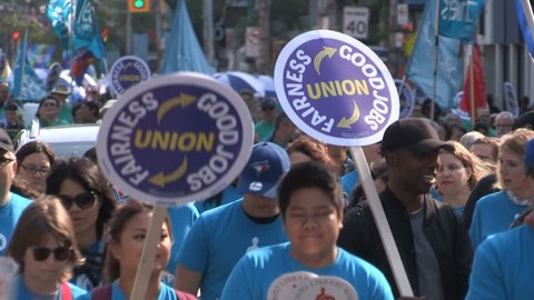 Toronto, Ontario, Canada September 2017 Union workers marching in solidarity for good job in Toronto labor day parade
