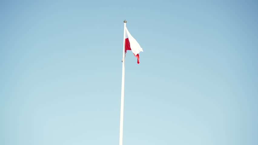 Flag of Poland in the wind against sky. 4K ProRes HQ codec