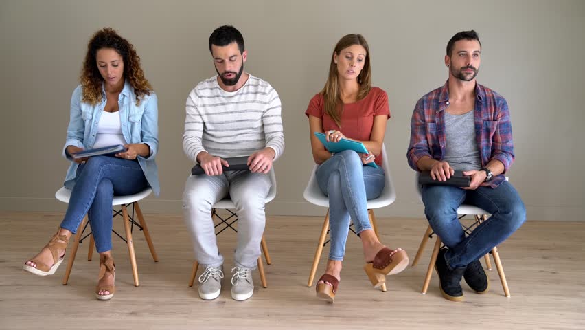 Group of young people in waiting for an interview Royalty-Free Stock Footage #30975607
