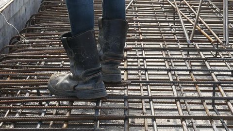 full hd vdo close up safety shoes construction worker steel rebar in construction site before casting precast concrete 
