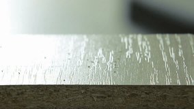 electric jigsaw cuts laminated board