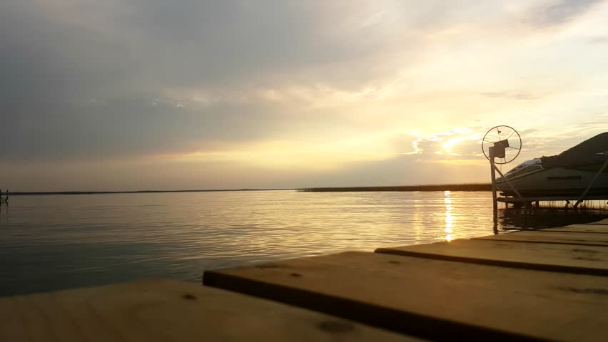 Time-lapse off of a pier on a lake