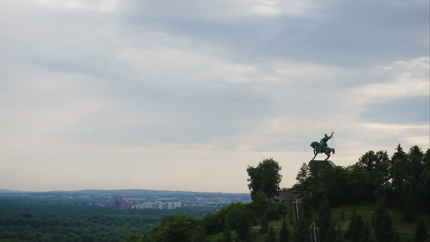 monument with a horse on top of a hill
