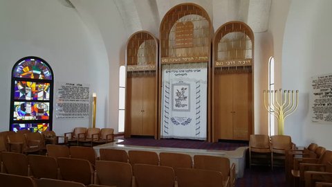 ISRAEL - CIRCA OCTOBER 2016 - Curtain covered Torah ark, Judaistic decoration, menorah, stage, painted window