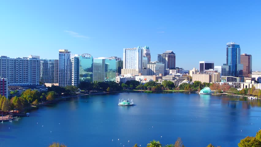 Orlando Florida aerial Orlando Lake Eola in the morning with urban skyscrapers clouds 