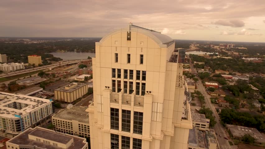 Orlando Florida aerial Orlando Lake Eola in the morning with urban skyscrapers clouds