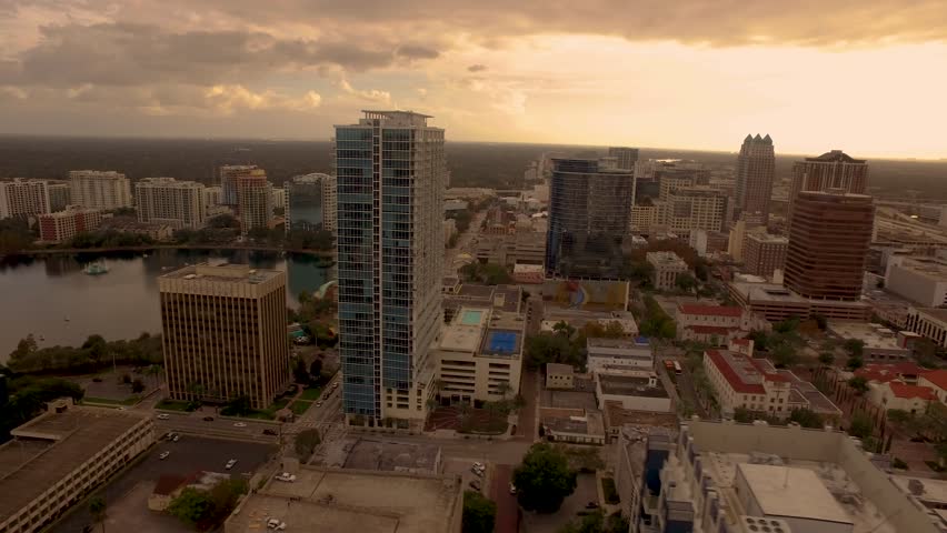 Orlando Florida aerial Orlando Lake Eola in the morning with urban skyscrapers clouds