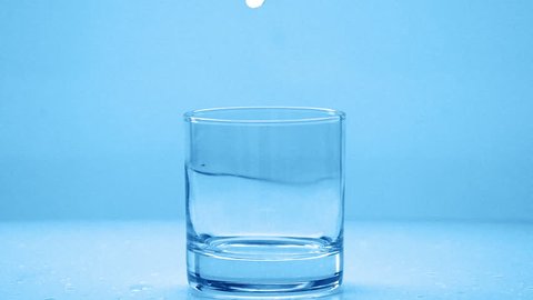 Pouring glass of water in slow motion fullHD real video Stock Video