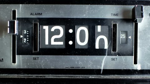 stop motion of an old style flip clock during 12 hours