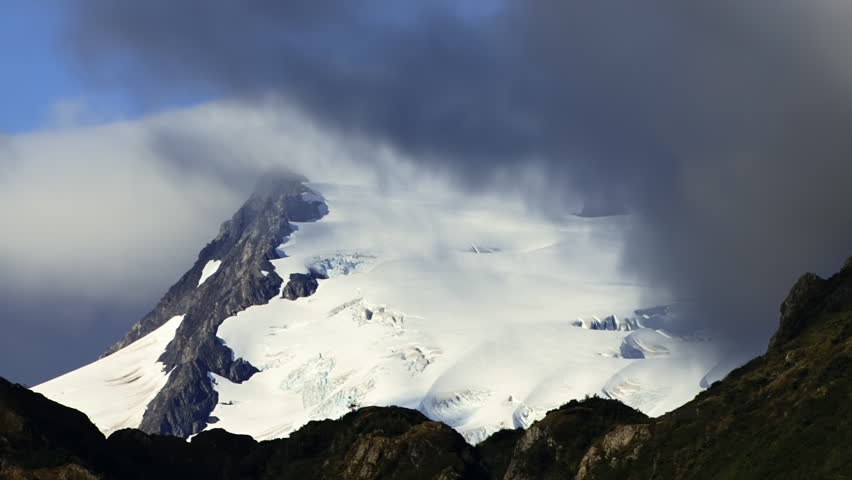 A high mountain glacier near Whittier, Alaska, wreathed in already fast-moving