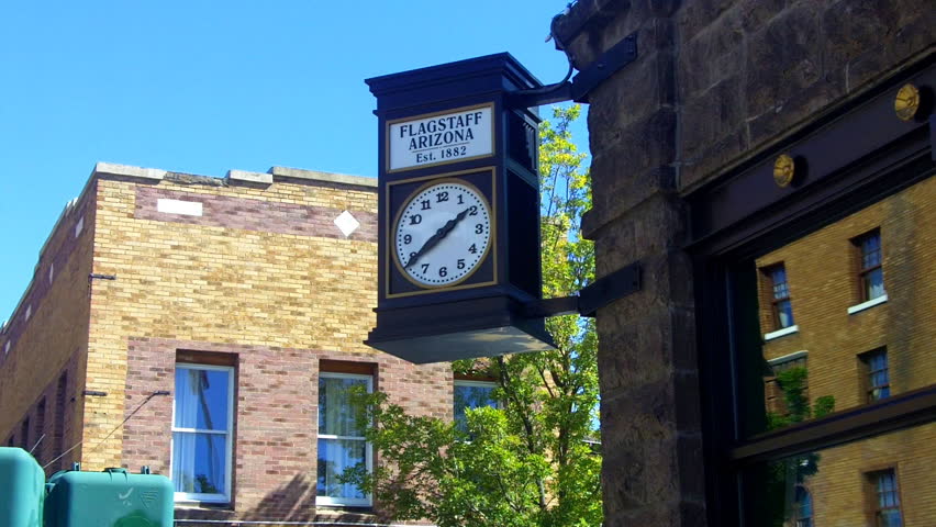 An historic clock tells the time in historic Downtown Flagstaff, Arizona.