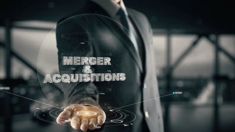 Merger & Acquisitions with hologram businessman concept