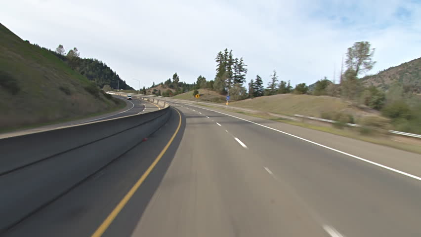 Driving up the hill on the freeway north of Cloverdale, CA. POV shot, driving