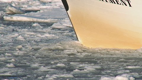 Boats Bow Pushing through Icy Slushy Waters