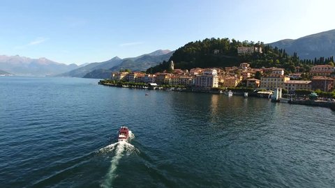 Village of Bellagio and boat on Como lake in Italy