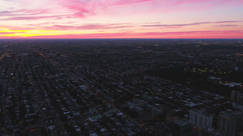 Montreal Quebec Aerial v101 Flying over downtown panning with dusk sunset views