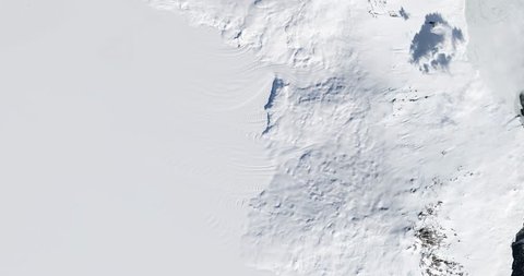 Very high-altitude overflight aerial of Ross Island on the McMurdo Ice Shelf, Antarctica.  Elements of this image furnished by NASA