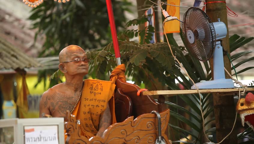 KO CHANG, THAILAND - NOV 28: Buddhist lama blesses participants Loy Krathong