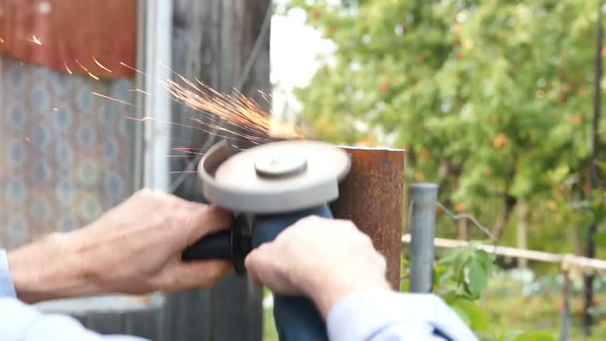 Worker man with electric tool