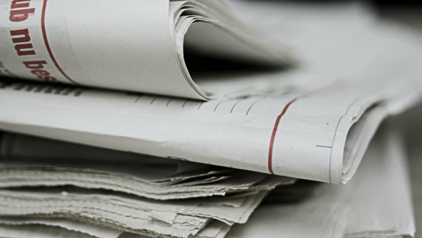 Close up shot of newspapers piling up Royalty-Free Stock Footage #31089505