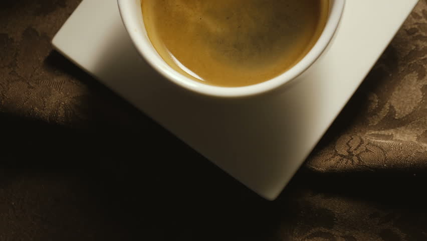 Pours milk into a coffee cup in a cafe | Shutterstock HD Video #31091545