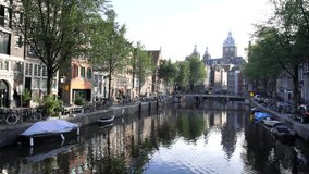 Afternoon view of beautiful canal of Amsterdam city, Netherlands
