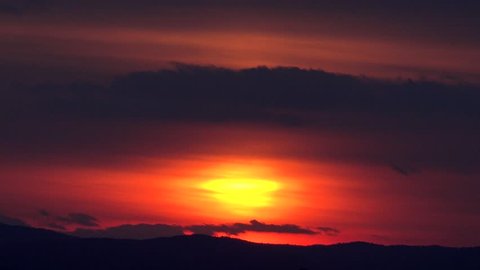 4K Timelapse of sun silhouette go down, amazing calm at mountain, sunset bright light