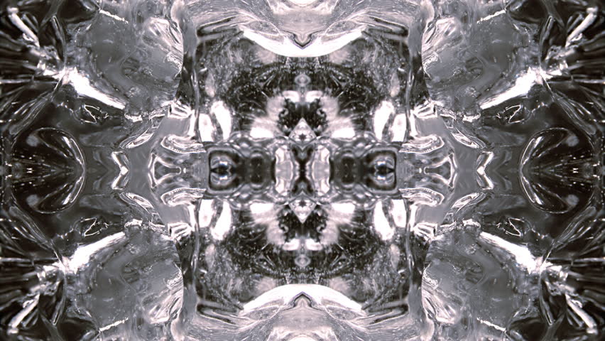 Rotating close-up, in kaleidoscopic quad pattern. Folding in. Based on strange