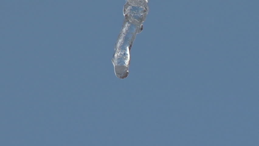 A very intimate look at a dripping icicle.