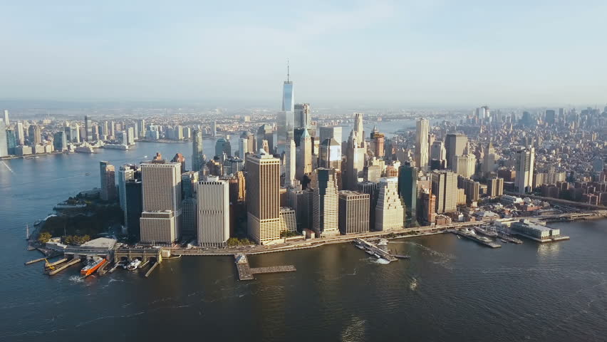 Aerial view of busy New York city in America, Manhattan district on the shore of East river. Drone flies to city centre. Royalty-Free Stock Footage #31103596