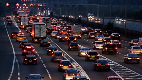 WATFORD, UK - SEPTEMBER 24, 2017 - Evening traffic jam on British motorway M1. M25/M1 junction