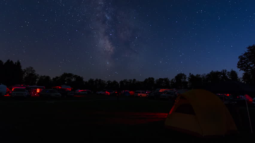 (Time-lapse) The Milky Way and stars move across the night sky over the astronomy field at Cherry Springs State Park, an International Dark Sky Park in West Branch Township, Pennsylvania.