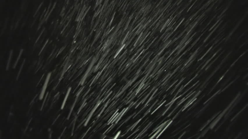 Sideways blizzard and a crazy videographer dancing with a light at night.