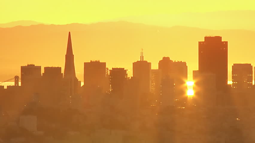 San Francisco skyline in the morning, a radiant sun bathing the entire scene in